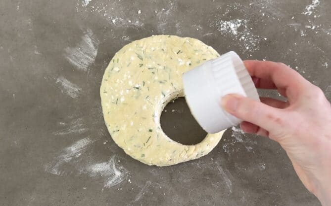 Using a cookie cutter to cut scones