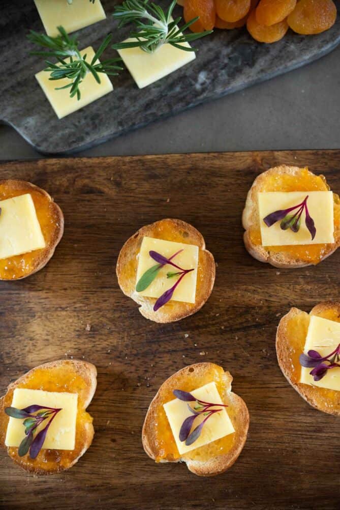 Apricot and cheese crostini viewed from overhead