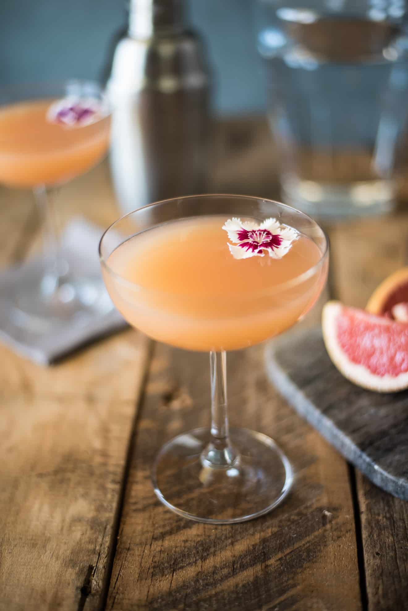 Beautiful pink grapefruit drink in a stemmed glass