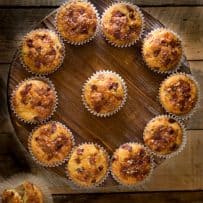 Bacon cheddar corn muffins displayed in a circle from overhead