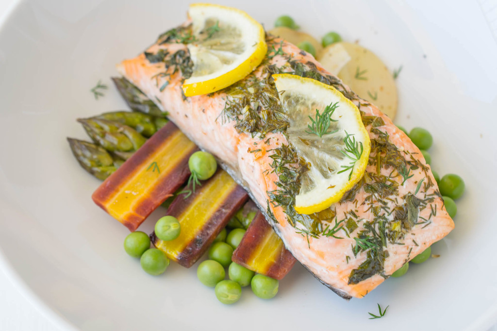 A closeup showing the lemon slices and dill