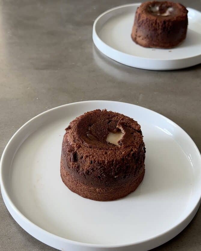 A molten lava cake on a white plate
