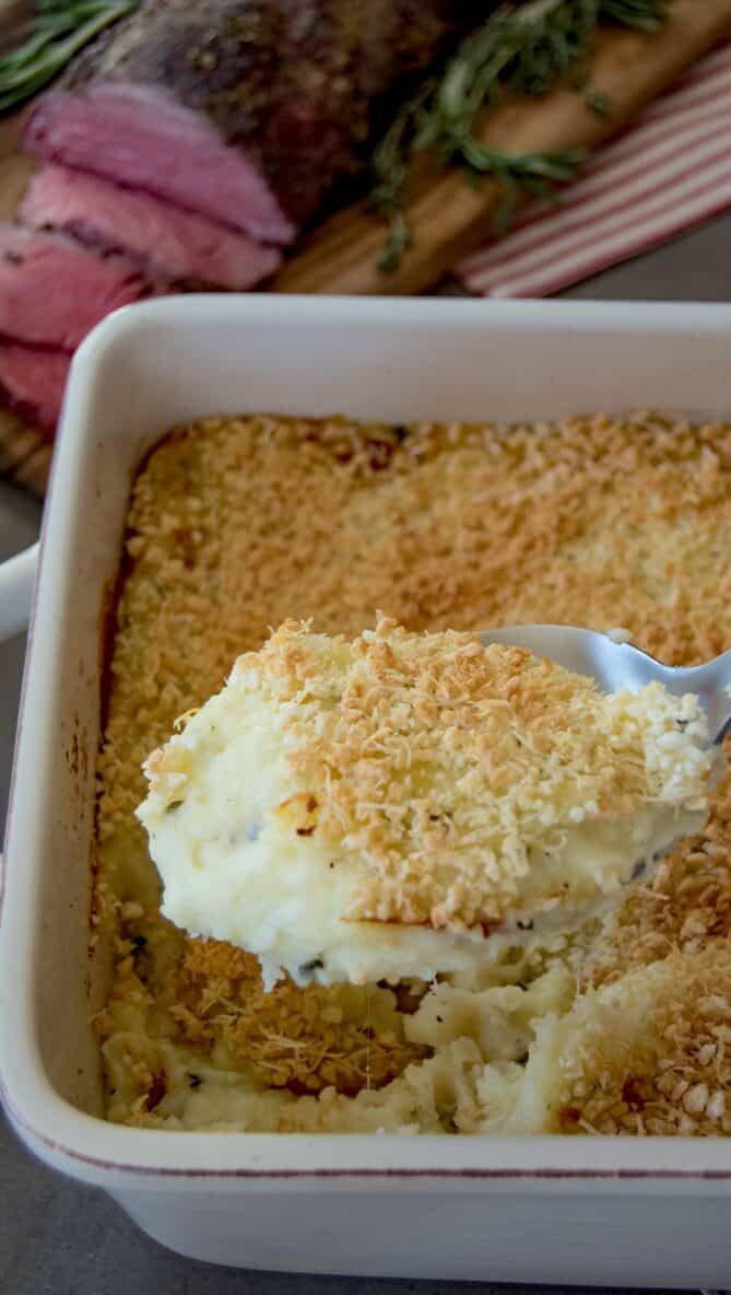A scoop of mashed potatoes on a ladle