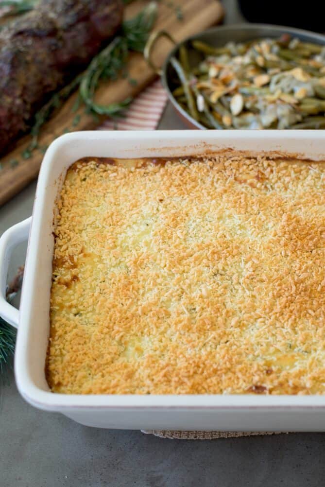 A casserole dish filled with mashed potato topped with panko breadcrumbs