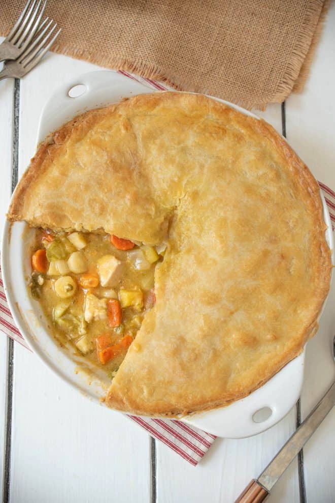 Perfectly browned pastry on a chicken pot pie with winter vegetables