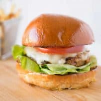 A chipotle chicken burger from the side