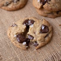 A chocolate chunk cookie pulled apart showing all the chocolate inside