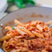Penne all'arrabbiate on a serving spoon