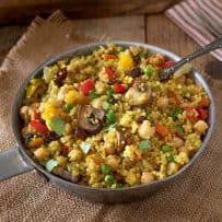 A pan of colorful curry vegetable quinoa