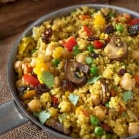 A closeup showing the mushrooms, peas and peppers