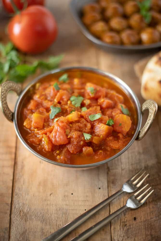 A bowl filled with Indian tomato chutney