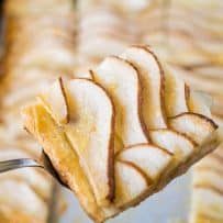 A closeup of a pear tart slice