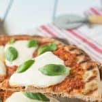 A slice of pizza being served