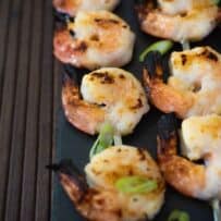 A closeup of perfectly grilled shrimp