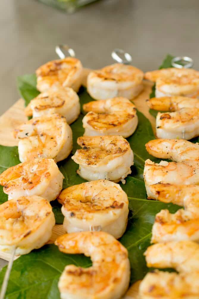 Rows of shrimp on skewers