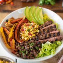 A fajita bowl in a white bowl ready to be eaten