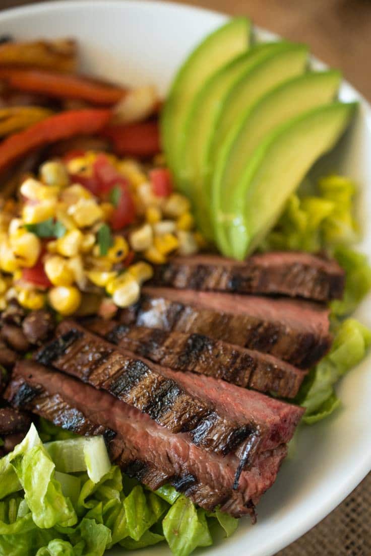 A closeup of the fajita bowl showing the charred and juicy steak