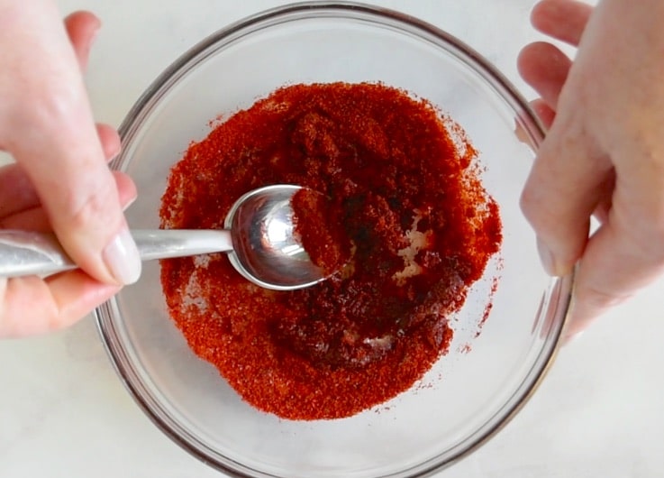 Indian spices mixed in a glass bowl