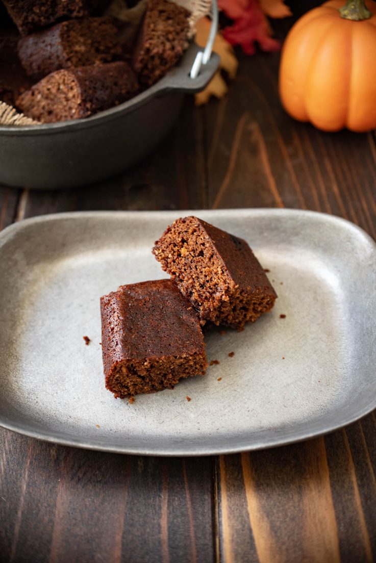 2 pieces of parkin cake on a sliver plate