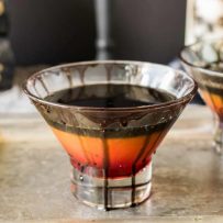 Halloween spooky screwdriver is a fun adult cocktail for everyone's favorite scary holiday with a mocktail option so no one is left out of the frightening fun. Layers of grenadine, orange juice and black colored vodka.