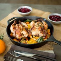 Herb roasted Cornish hens with root vegetables might just be the perfect one pan, Thanksgiving dinner for 2. Individual Cornish hens are crusted with fresh herbs, then roasted on a bed of root vegetables and apple for a delicious, pan roasted meal.