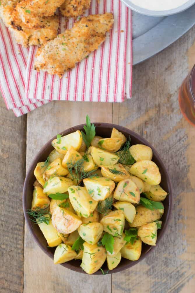 A round bowl of potato salad viewed from overhead