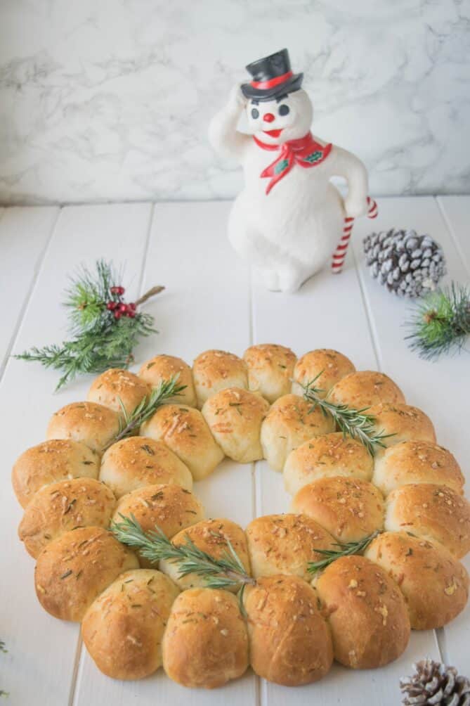 A side view of a bread wreath with Frosty the Snowman