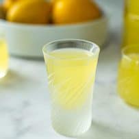 Small glasses of homemade limoncello