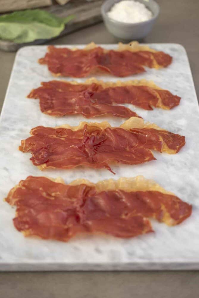 Italian ham on a piece of marble