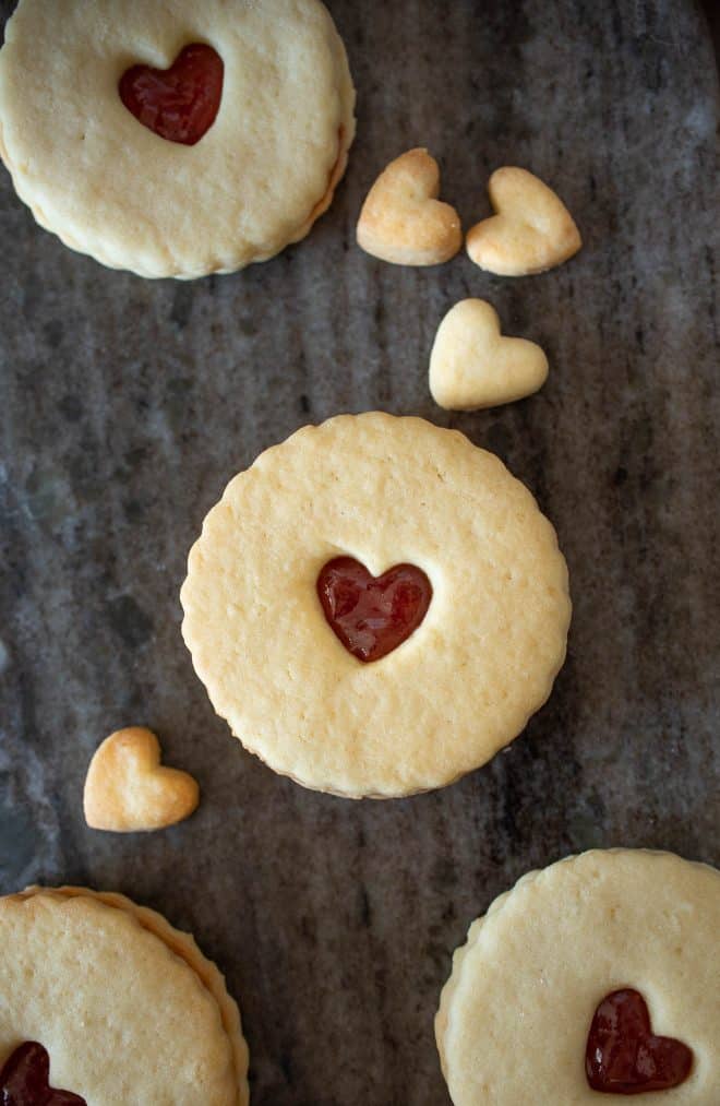 Jammie Dodgers Cookies on a grey serving plate with small heart cookies