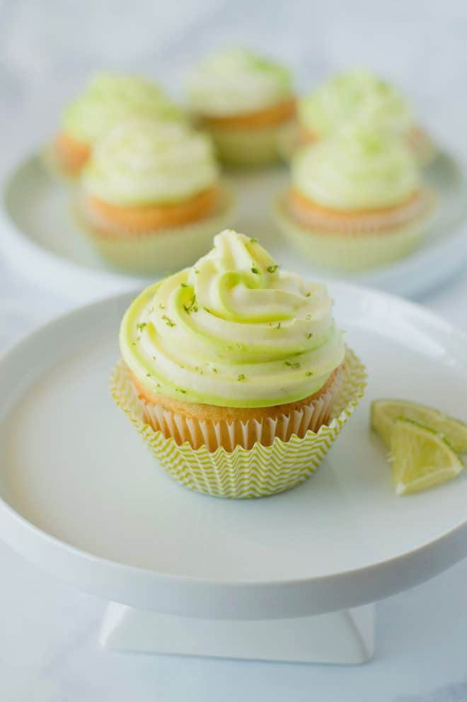 1 key lime cupcake on a cake stand