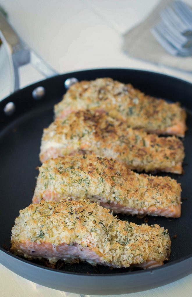 4 lemon parmesan crusted salmon filets in a pan