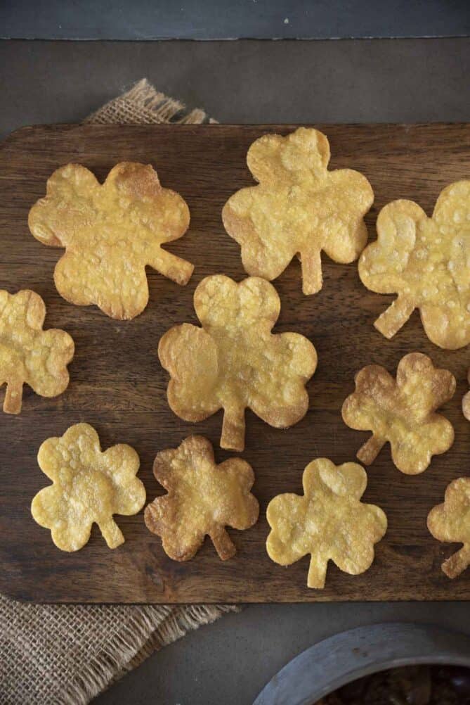 Shamrock shaped tortilla chips on a board