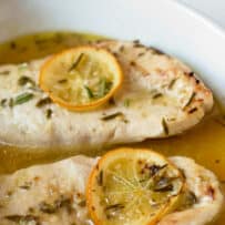 A Meyer lemon sauce braising chicken breasts