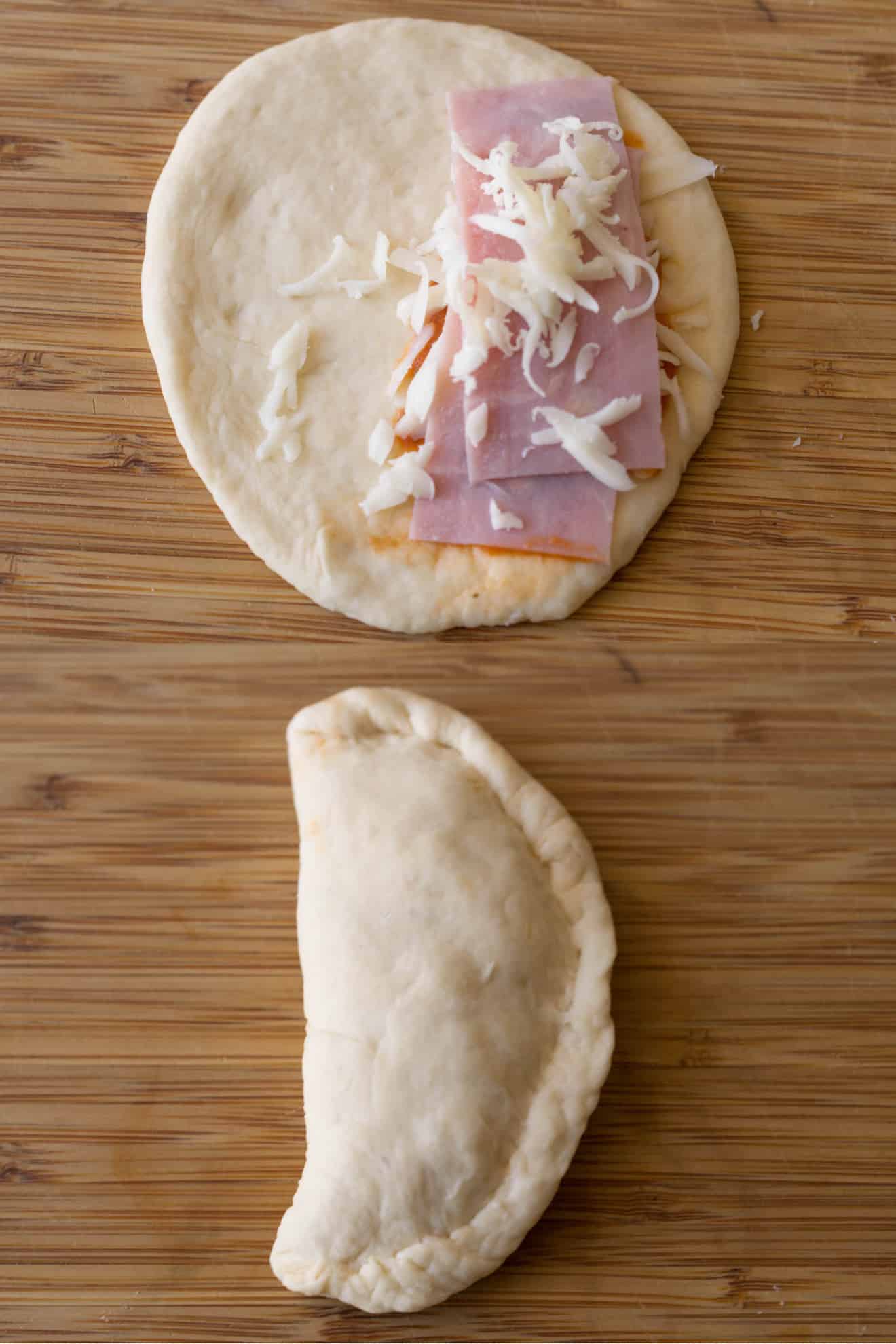 The making of a ham and cheese calzone. Uncooked pizza dough with ham and cheese, then folded over