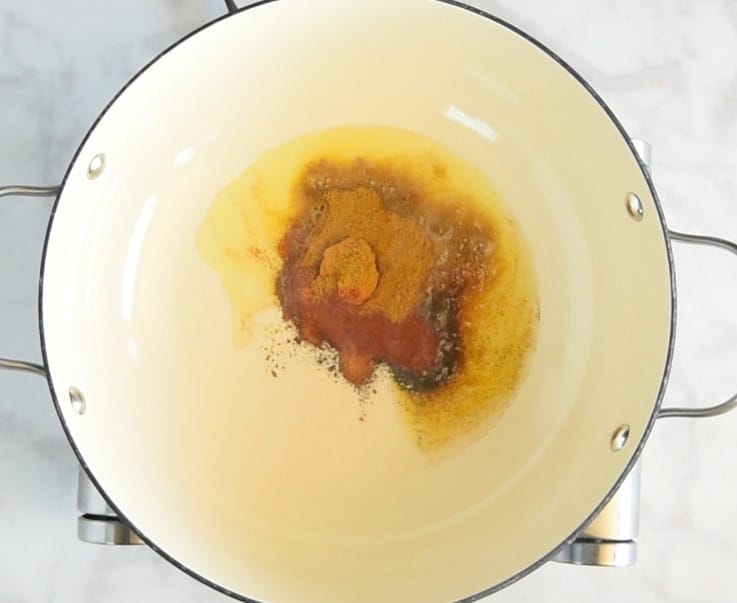 Spices being toasted in a pan