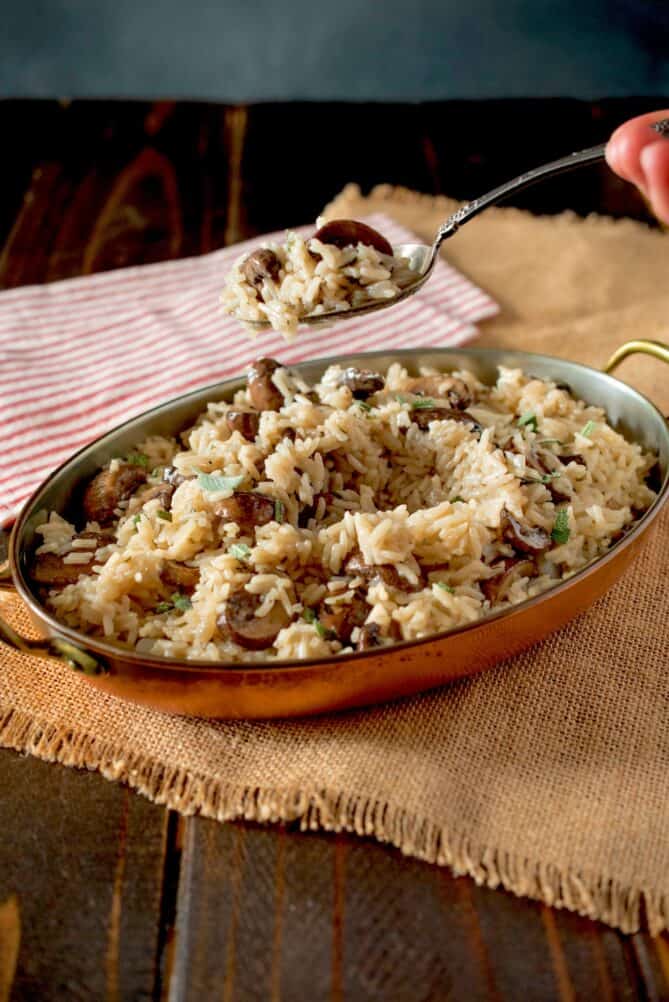 Scooping a spoonful of rice pilaf