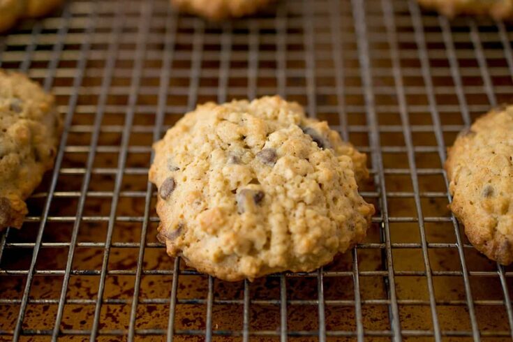 An oatmeal cookie with chocolate chips and raisins