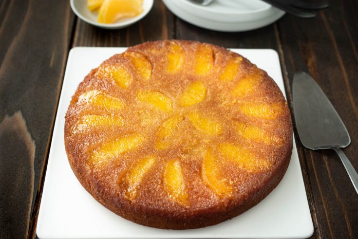 Orange salted caramel upside down cake ready for slicing