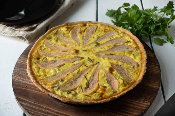 Pear slices fanned on top of a quiche
