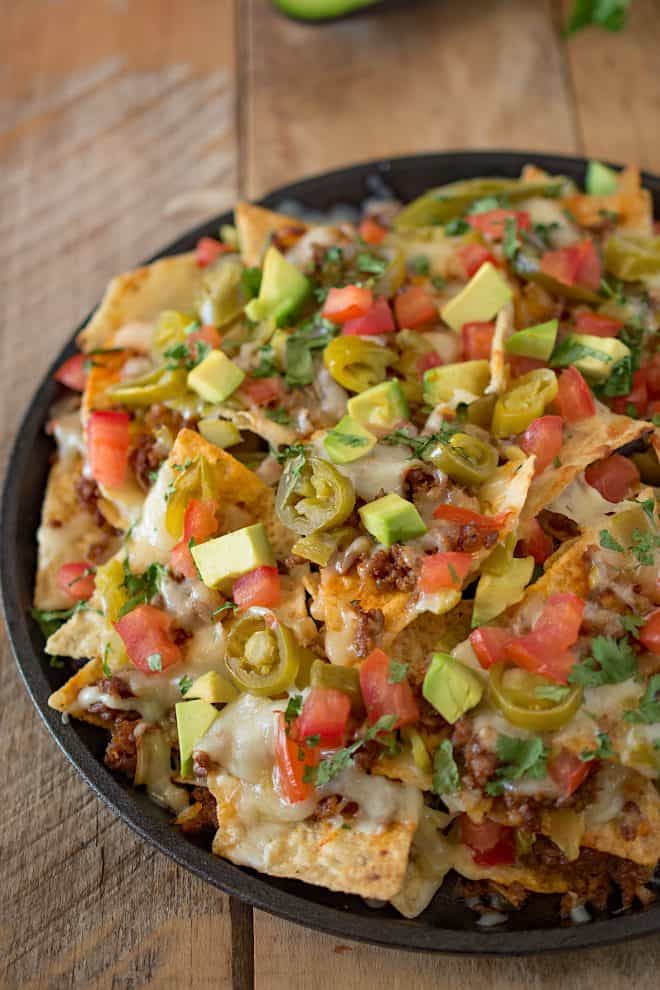 A closeup showing the green avocado, jalape&ntilde;o, tomato and meat