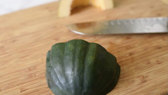 Slicing an acorn squash