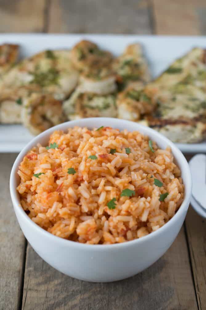 Mexican rice garnished with chopped cilantro