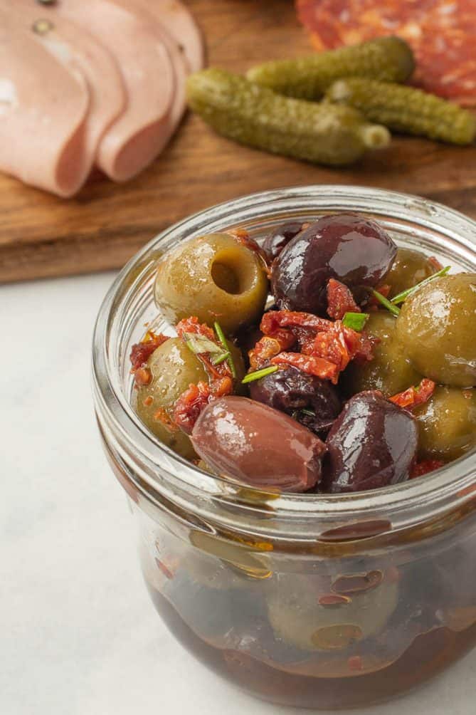 A closeup showing the sweet sun-dried tomatoes and rosemary leaves