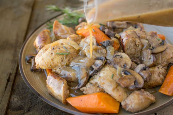 Chicken thighs, sausage, mushrooms and carrots with gravy