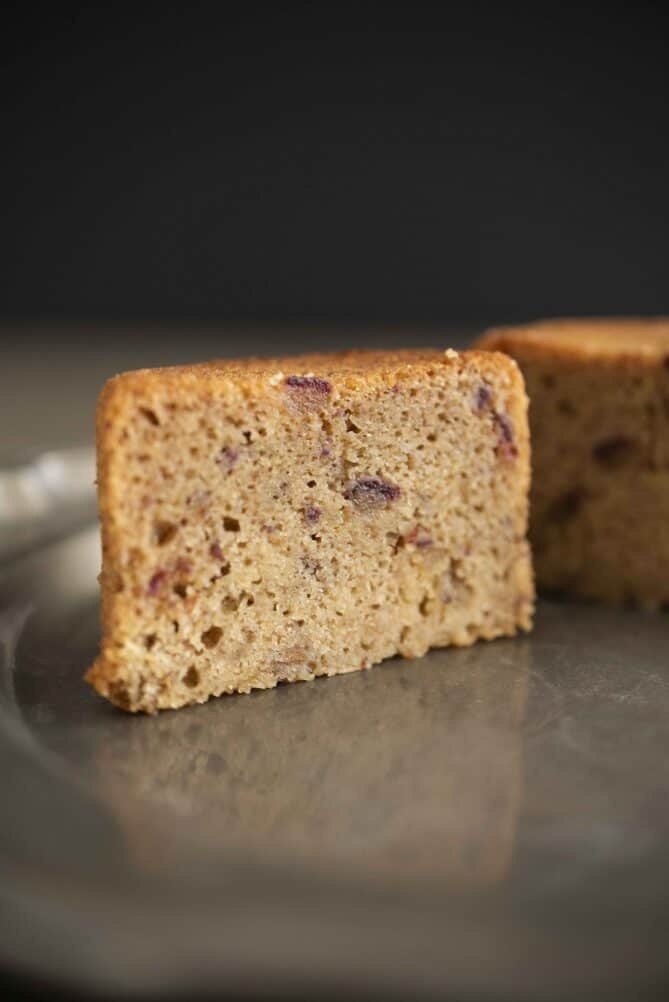 A sticky toffee pudding cut in a half