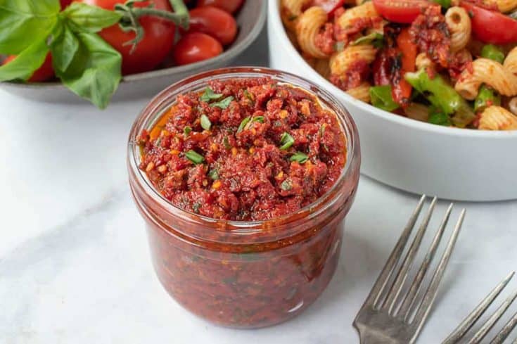 Sun-dried tomato pesto in a glass jar