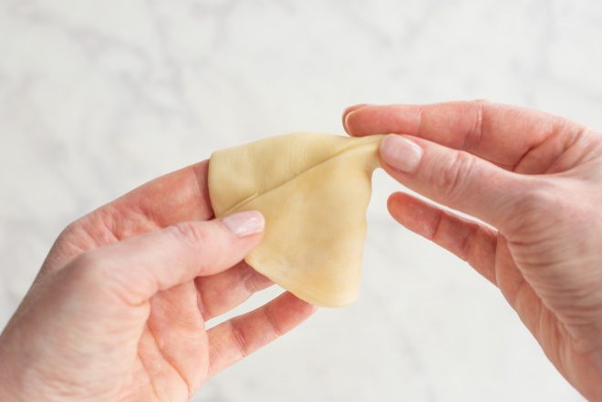 A cone shape is made using the dough