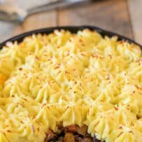 A traditional shepherd's pie in a cast iron skillet