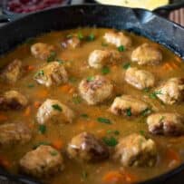 Turkey meatballs cooking in vegetables and gravy